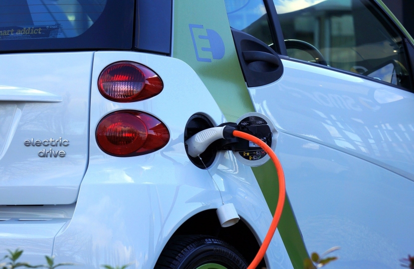 An electric vehicle being charged.